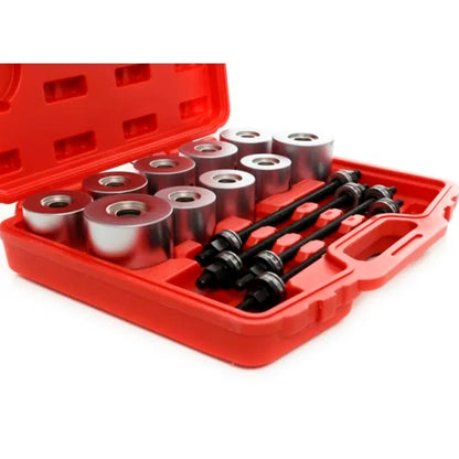 Zestaw do montażu i demontażu tulei w czerwonej walizce, z metalowymi tulejami i śrubami prowadzącymi do prac serwisowych przy zawieszeniu pojazdów.