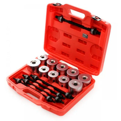 Warsztatowy zestaw do montażu i demontażu tulei w czerwonej walizce, z kompletem metalowych tulei i śrub prowadzących do serwisowania zawieszenia pojazdów.